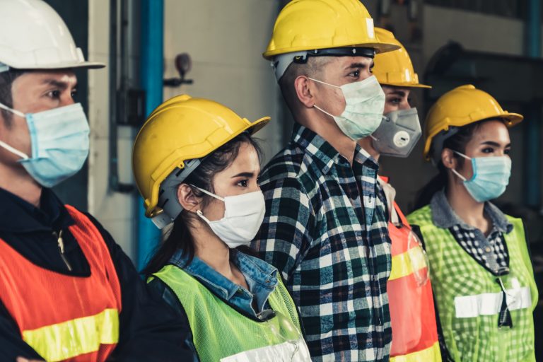 Workers with face mask protect from outbreak of Corona Virus Disease 2019